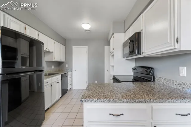 $310,000 | 6560 Delmonico Drive, Unit 201, Colorado Springs, CO 80919