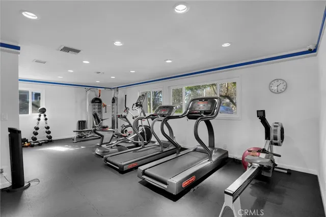 a view of an house with backyard and pool