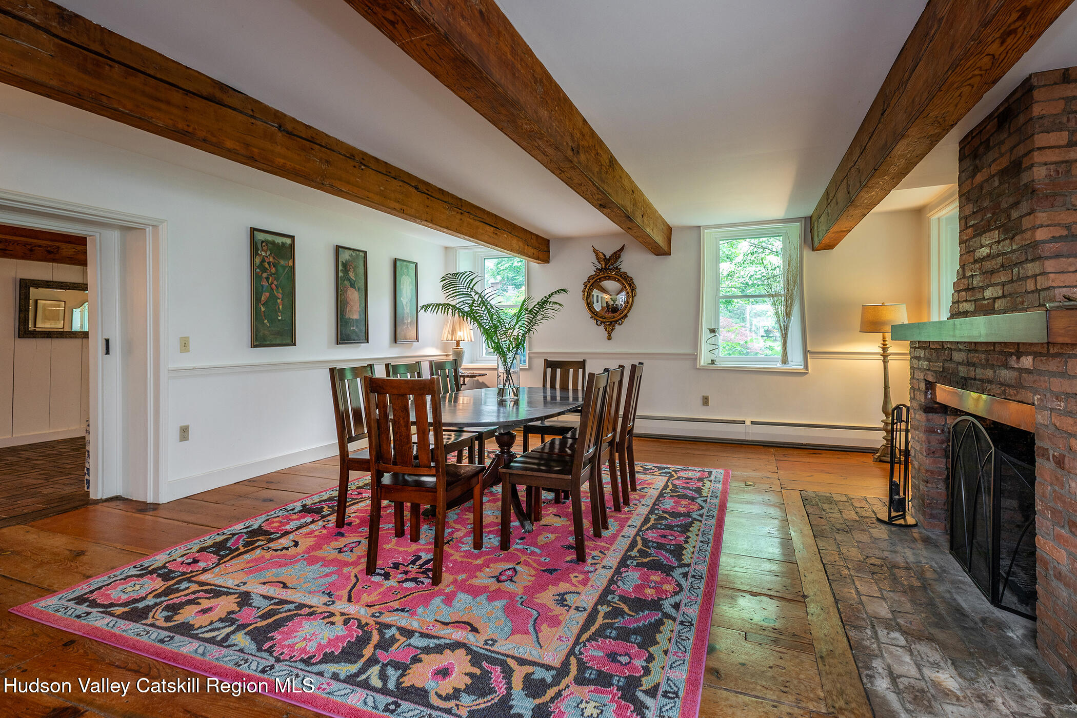 202 Buckwheat Bridge Road Germantown, NY 12526 - Photo 11 of 47 a view of a dining room with furniture and wooden floor
