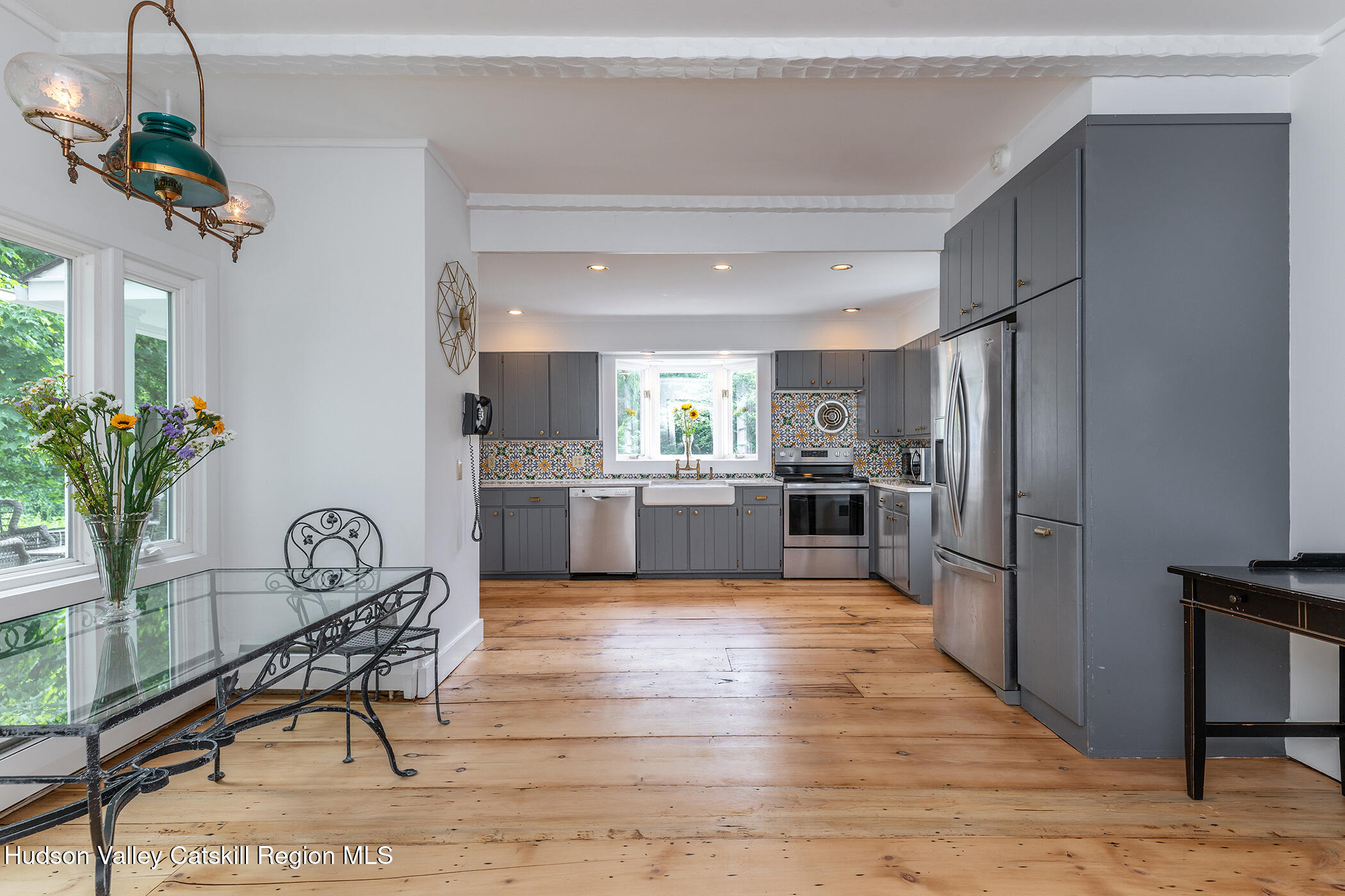 202 Buckwheat Bridge Road Germantown, NY 12526 - Photo 12 of 47 a kitchen with granite countertop stainless steel appliances a counter top space and cabinets