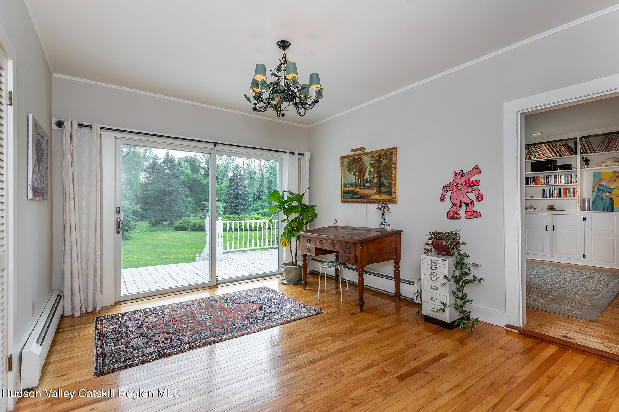 202 Buckwheat Bridge Road Germantown, NY 12526 - Photo 15 of 47 a view of a livingroom with furniture window and wooden floor