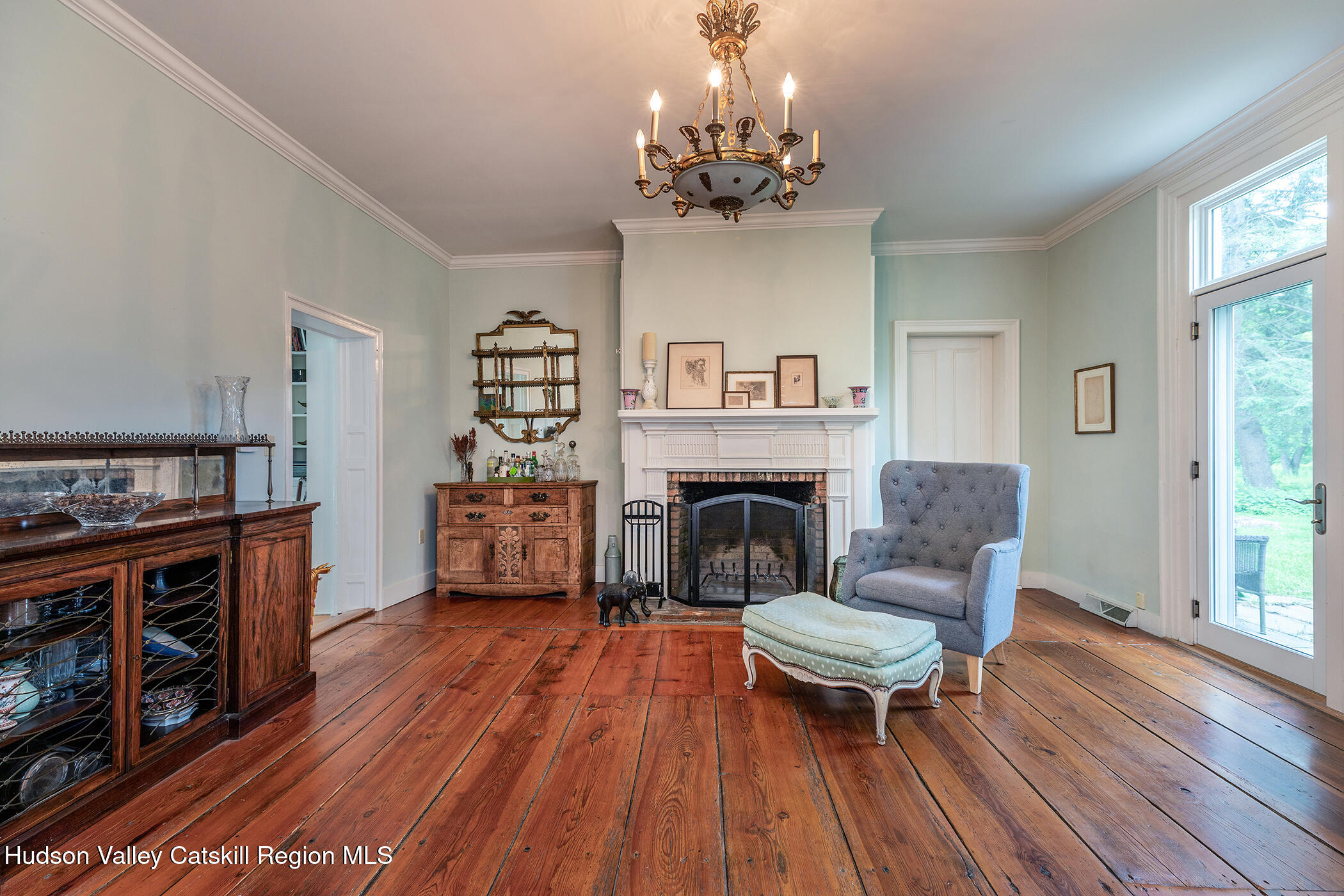 202 Buckwheat Bridge Road Germantown, NY 12526 - Photo 18 of 47 a living room with furniture and a fireplace