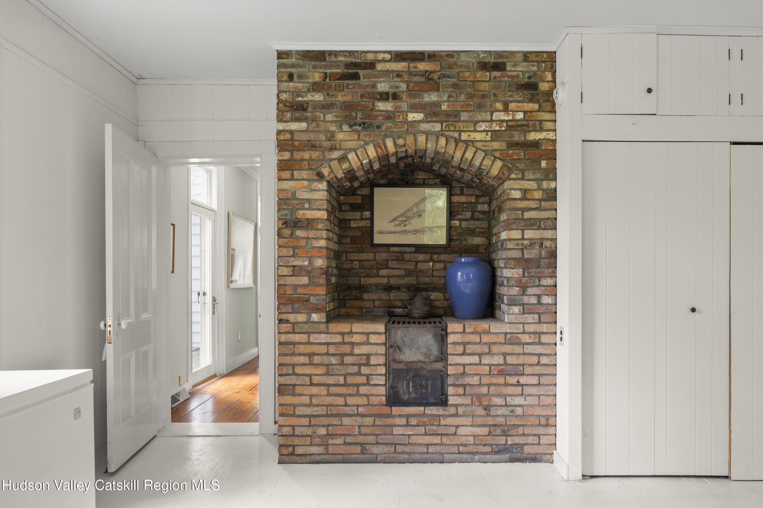 202 Buckwheat Bridge Road Germantown, NY 12526 - Photo 19 of 47 a brick oven with a fireplace