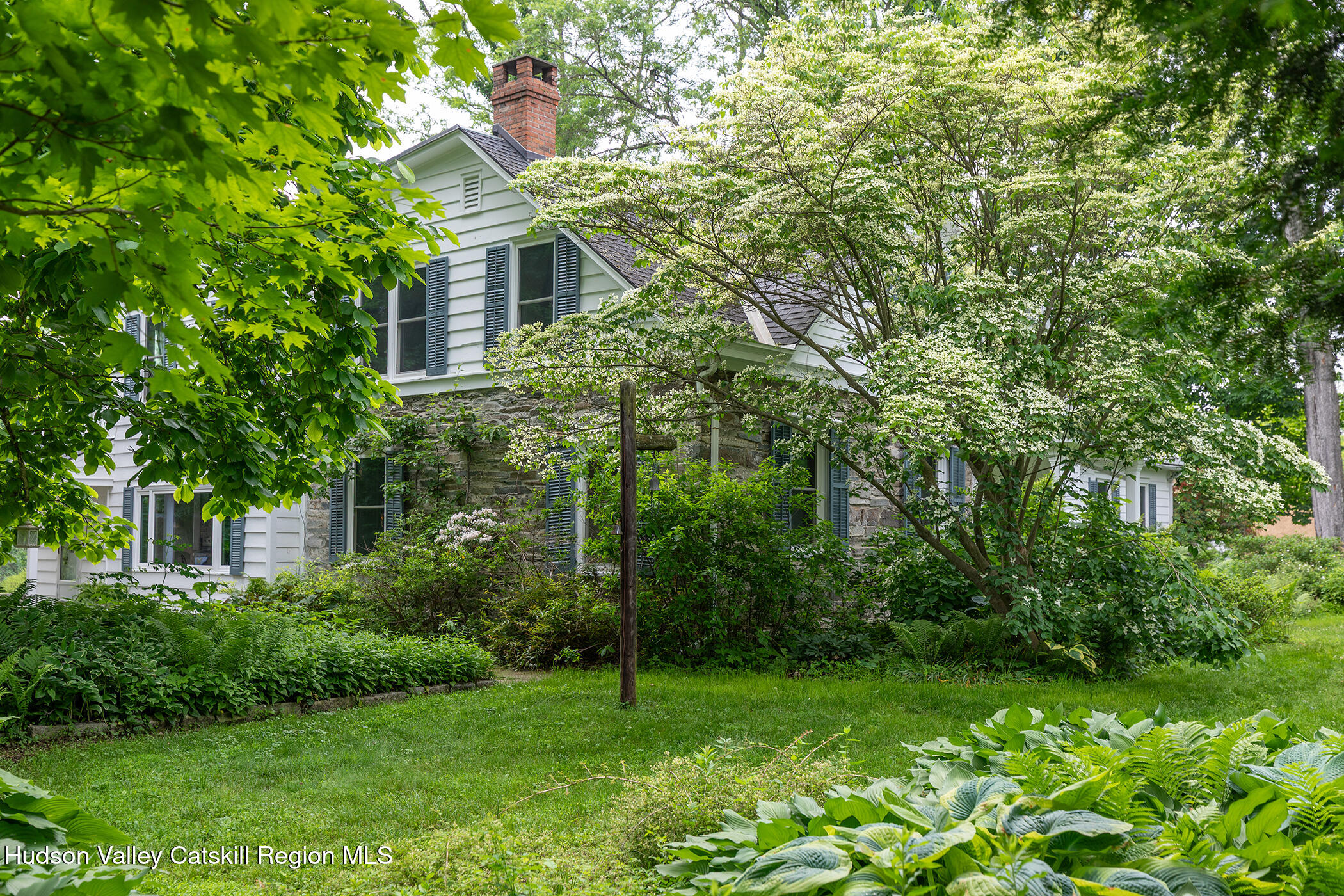 202 Buckwheat Bridge Road Germantown, NY 12526 - Photo 30 of 47 a view of a house with a backyard