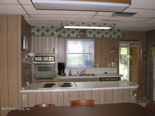 6640 Brooklyn Bay Road Keystone Heights, FL 32656 - Photo 5 of 5 a view of kitchen with kitchen island sink stove and refrigerator