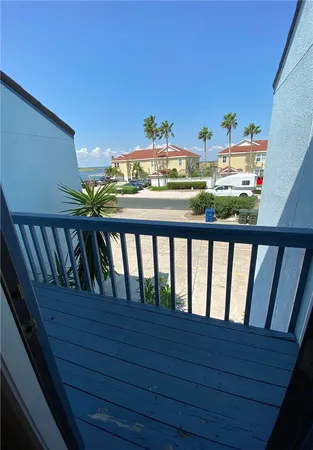a view of a house with outdoor seating space