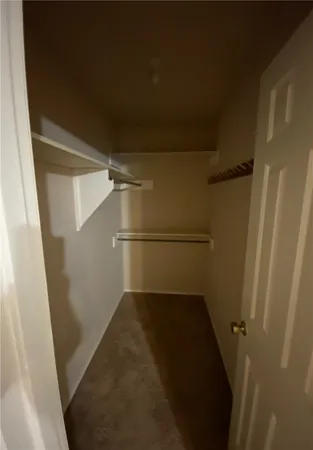 a view of a livingroom with a staircase
