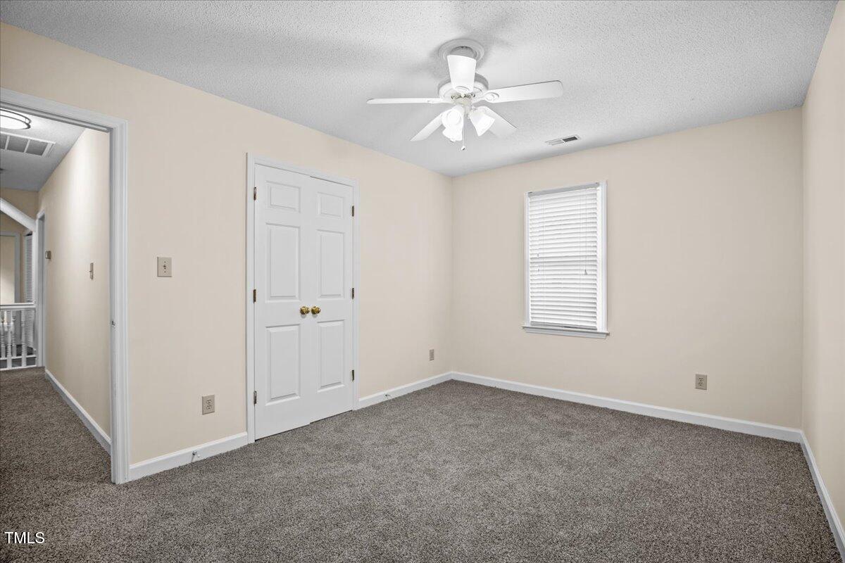 4309 Birmingham Way Raleigh, NC 27604 - Photo 29 of 60 a view of an empty room with a window