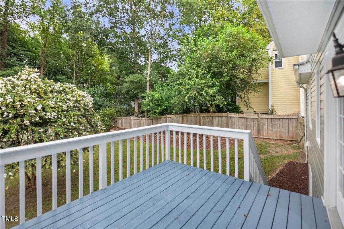 4309 Birmingham Way Raleigh, NC 27604 - Photo 55 of 60 a balcony with wooden floor and outdoor space