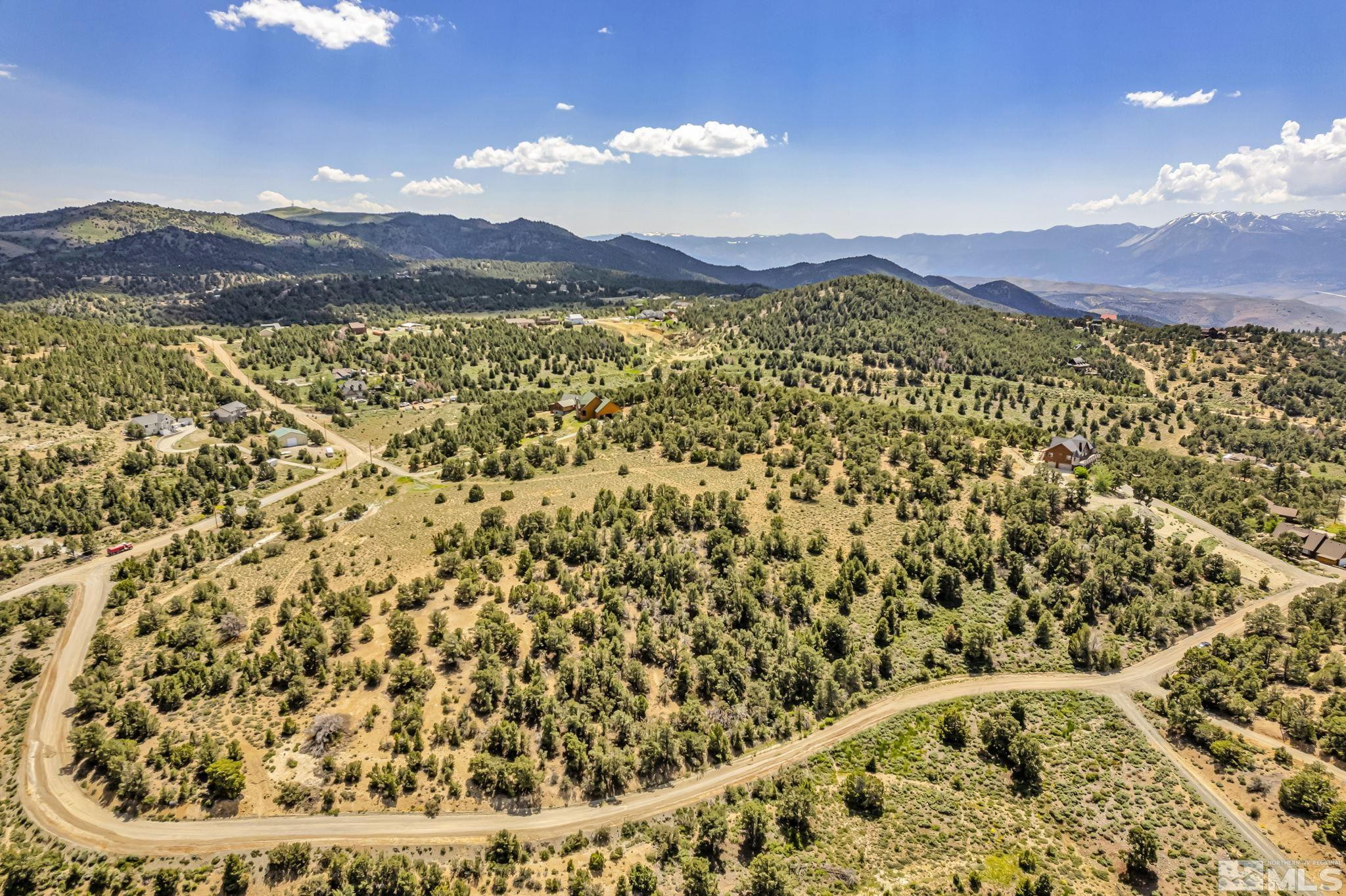 21499 Crestview Road Reno, NV 89521 - Photo 2 of 8 a view of a city with sunset view