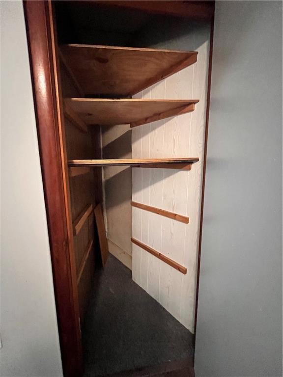 507 Harmony Avenue, Unit 1R Rochester, PA 15074 - Photo 17 of 18 a view of walk in closet with empty racks