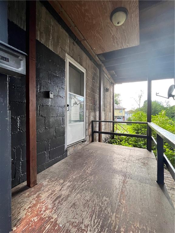 507 Harmony Avenue, Unit 1R Rochester, PA 15074 - Photo 2 of 18 a view of backyard with wooden floor and outdoor space