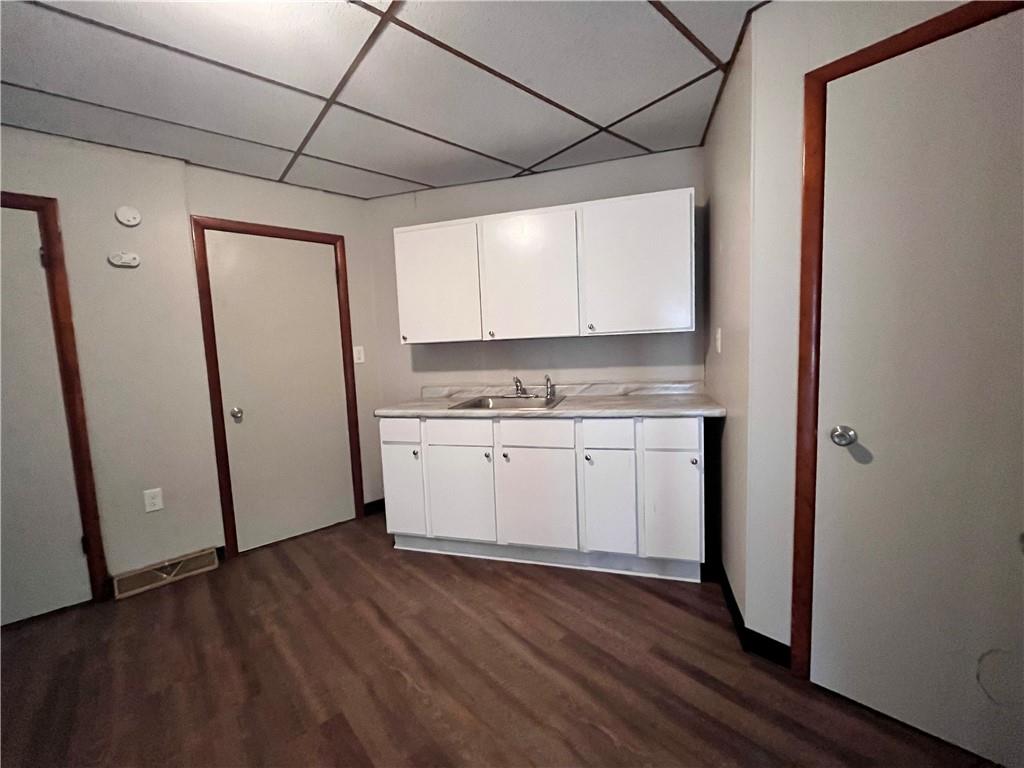 507 Harmony Avenue, Unit 1R Rochester, PA 15074 - Photo 4 of 18 a view of cabinets with wooden floor