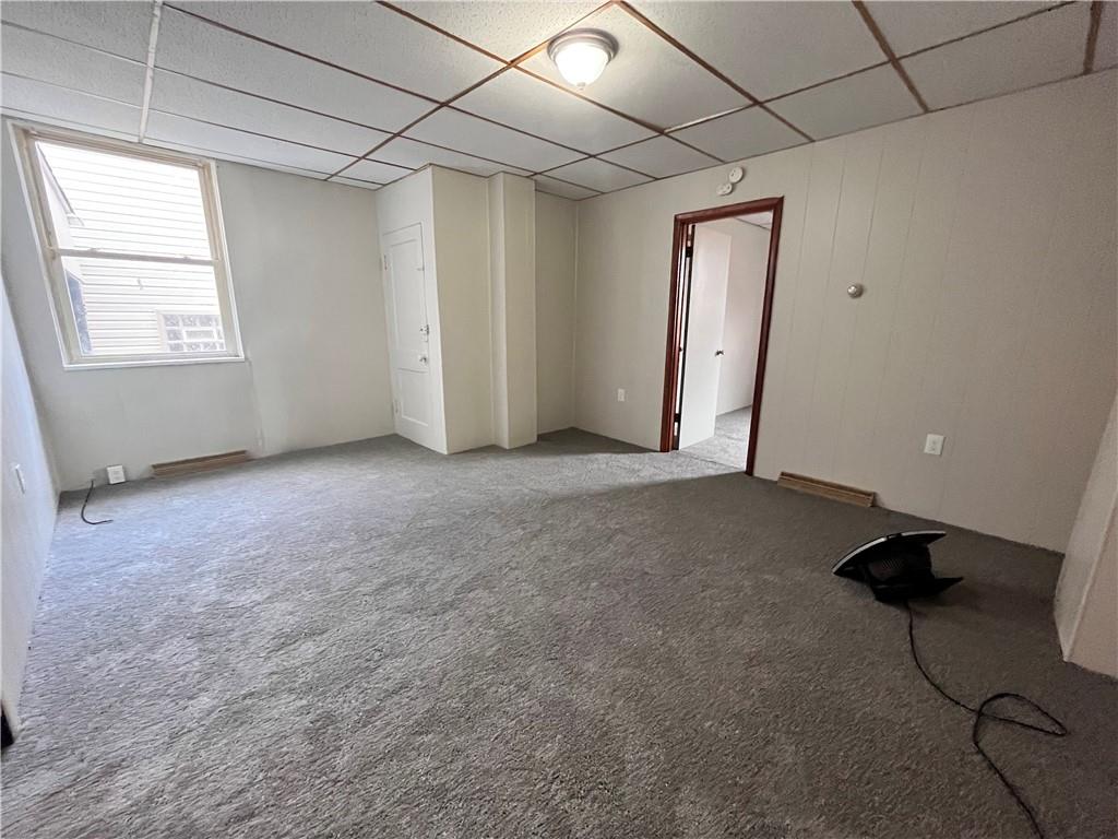507 Harmony Avenue, Unit 1R Rochester, PA 15074 - Photo 6 of 18 a view of an empty room with a window