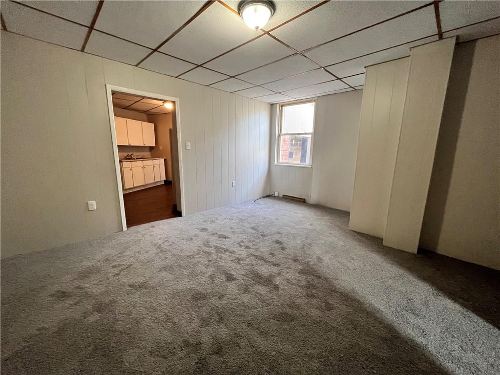 507 Harmony Avenue, Unit 1R Rochester, PA 15074 - Photo 9 of 18 a view of empty room with windows