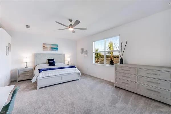 a view of a living room and balcony