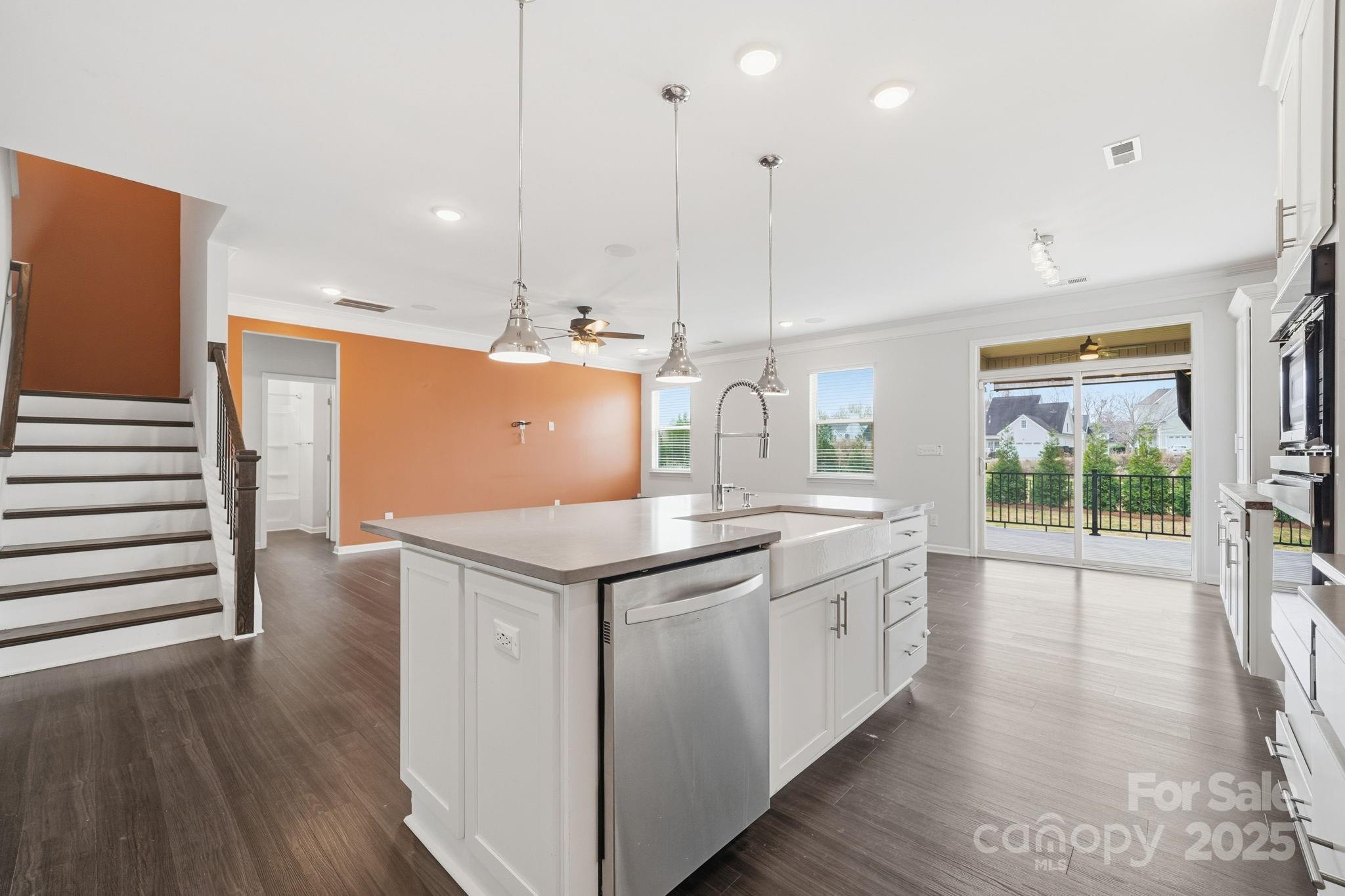 2612 Keady Mill Loop Kannapolis, NC 28081 - Photo 18 of 48 a kitchen with a sink and wooden floor