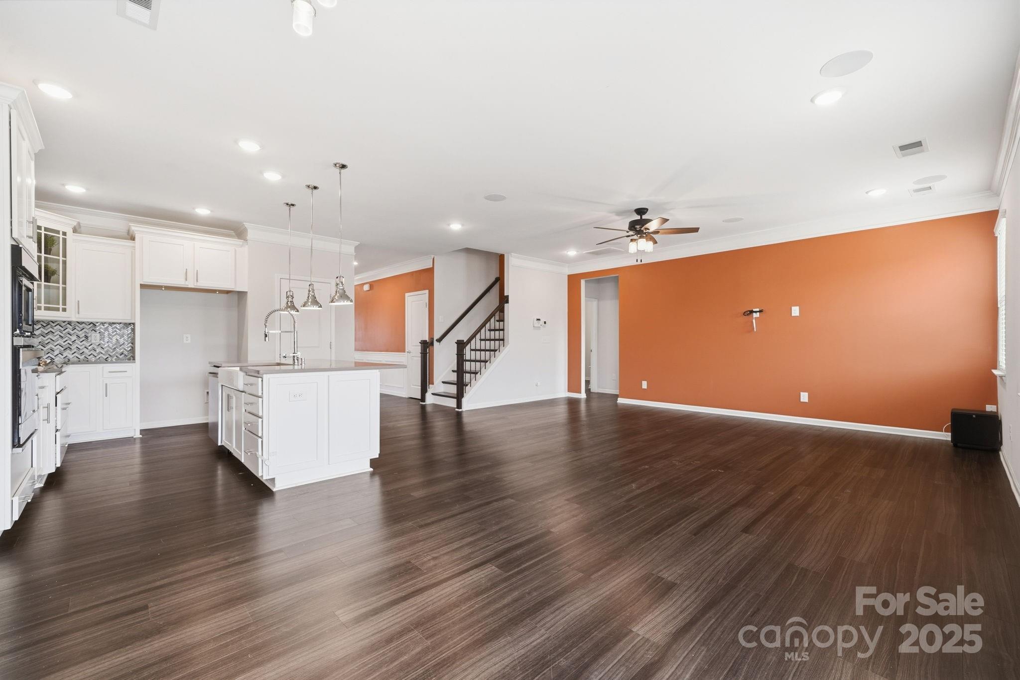 2612 Keady Mill Loop Kannapolis, NC 28081 - Photo 19 of 48 a view of kitchen with cabinets and wooden floor