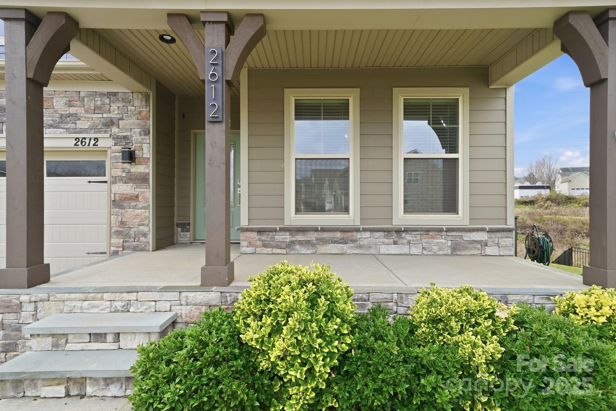 2612 Keady Mill Loop Kannapolis, NC 28081 - Photo 2 of 48 front view of the house with a large window