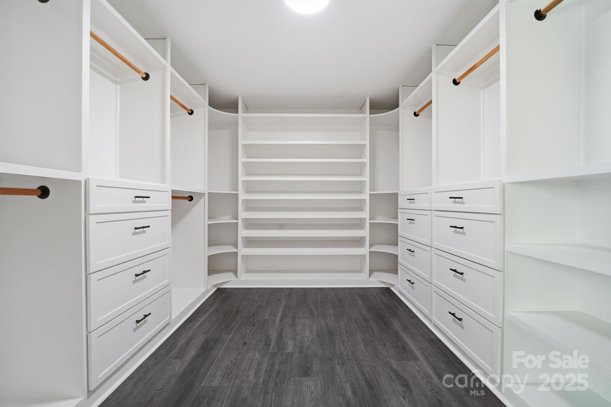 2612 Keady Mill Loop Kannapolis, NC 28081 - Photo 30 of 48 a view of walk in closet with empty racks