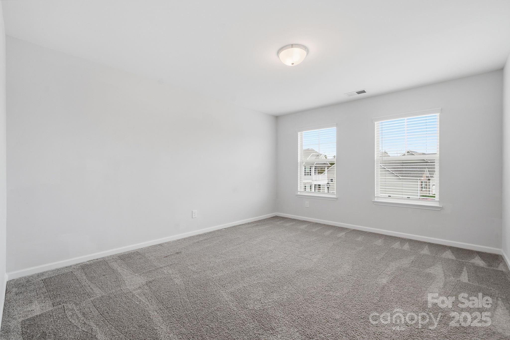 2612 Keady Mill Loop Kannapolis, NC 28081 - Photo 33 of 48 an empty room with windows