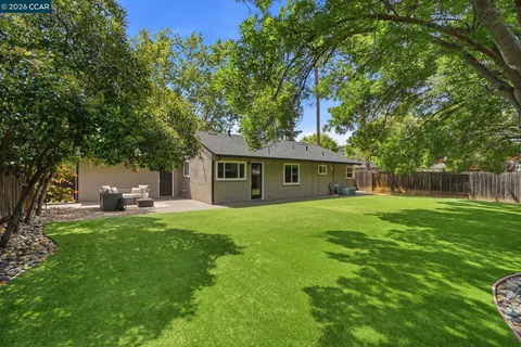 a garden view with a seating space