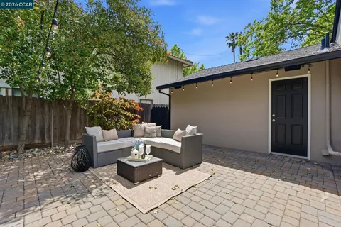 a view of a backyard with a garden