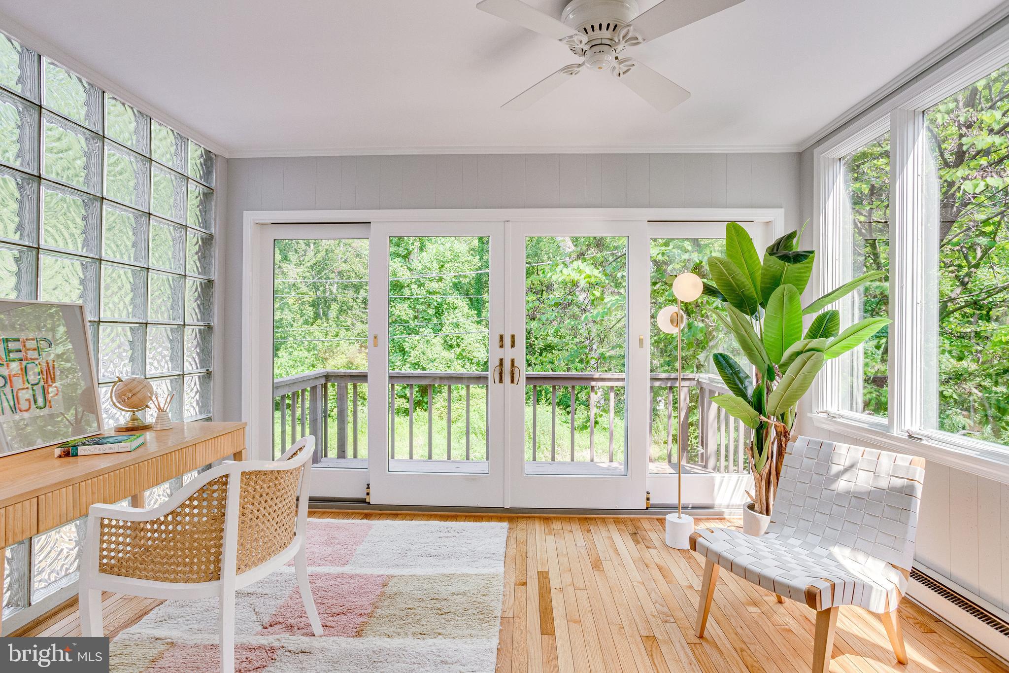 1563 44th Street Northwest Washington, DC 20007 - Photo 14 of 46 Sunroom off DR with sliders and deck