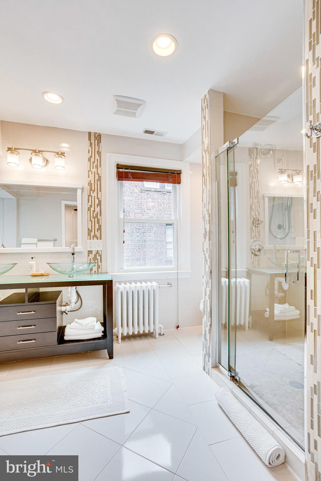 1563 44th Street Northwest Washington, DC 20007 - Photo 20 of 46 Ensuite BR with double vanity and glass shower