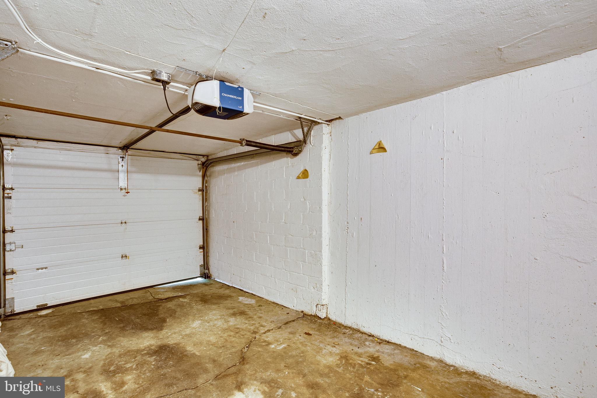 1563 44th Street Northwest Washington, DC 20007 - Photo 39 of 46 Lower level small mini-cooper sized storage garage