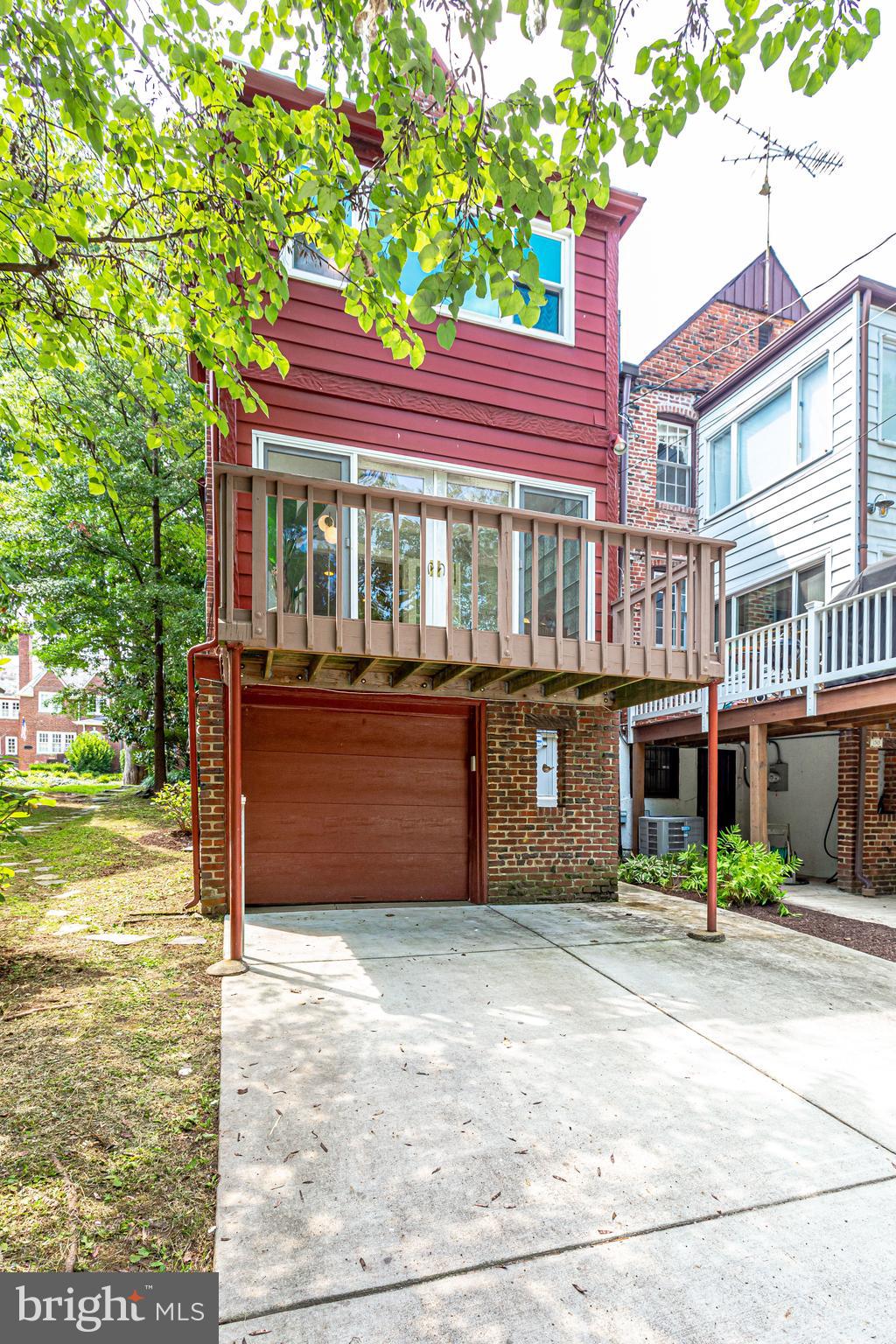 1563 44th Street Northwest Washington, DC 20007 - Photo 41 of 46 Garage with deck and large parking pad for 2 cars