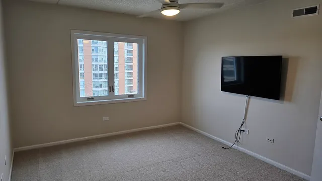 a view of a room with racks on the wall