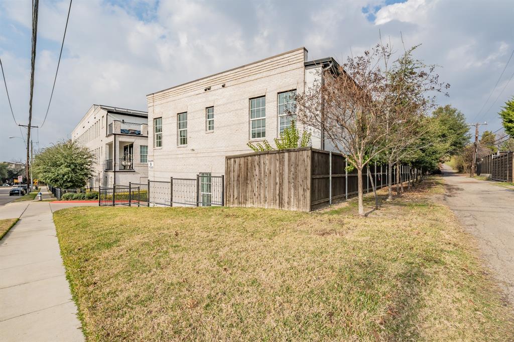 7333 Valley View Lane, Unit 902 Dallas, TX 75240 - Photo 34 of 40 a front view of a house with a yard