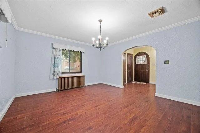 a kitchen with sink cabinets and refrigerator
