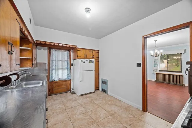 a view of a hallway with windows