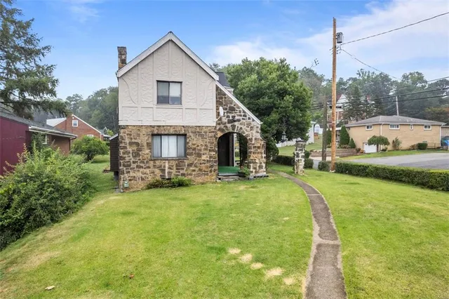 a house view with a garden space