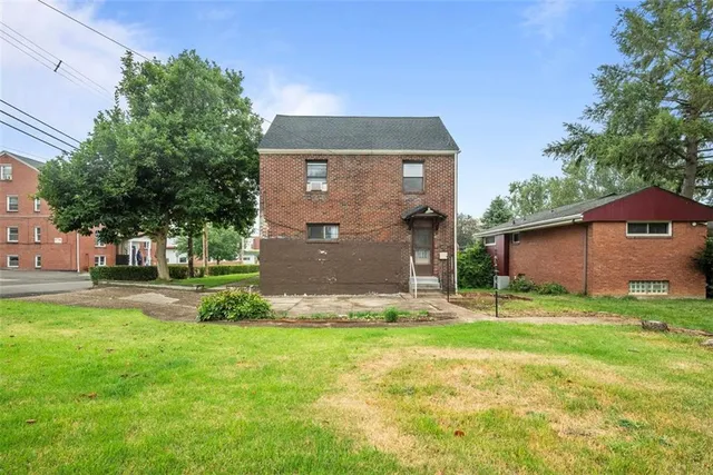 a view of a house with garden