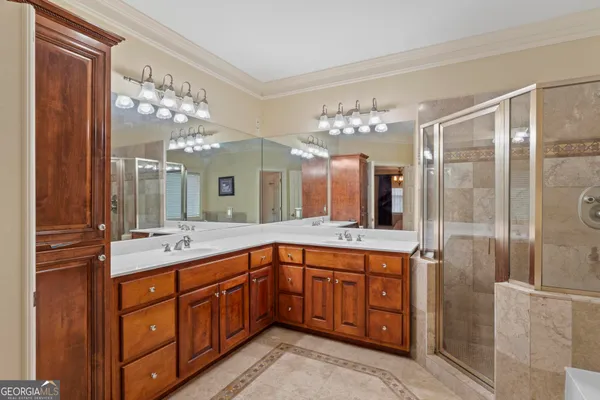 a bathroom with a toilet a sink and a window