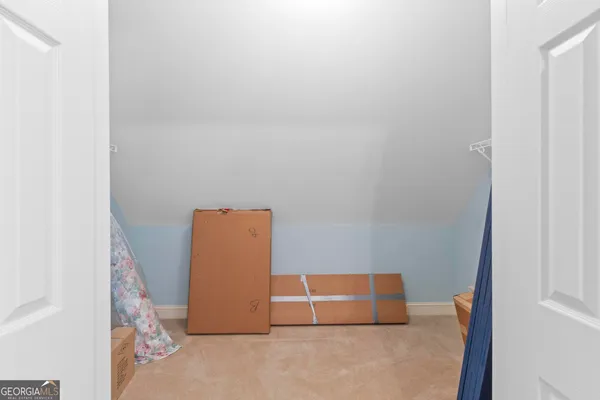 a view of a golf course with a lake