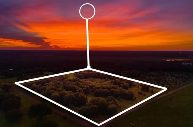 a view of swimming pool from a balcony