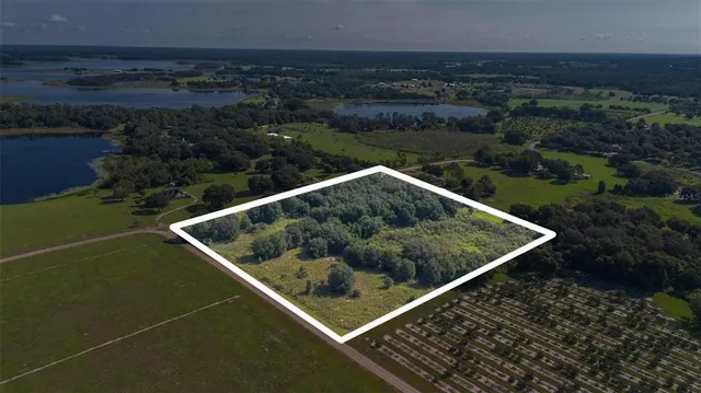 a view of a road with a yard