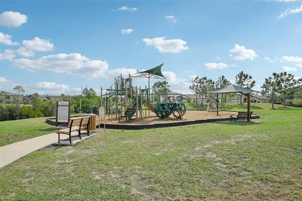 a view of an outdoor space and tennis court