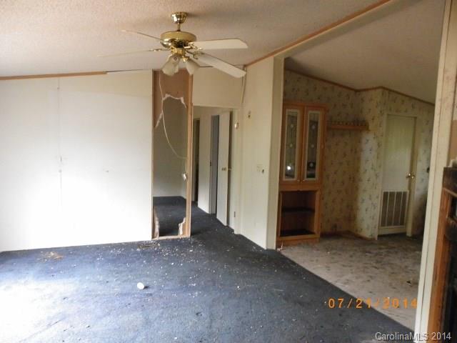 1978 Steel Hill Road Van Wyck, SC 29720 - Photo 2 of 9 an empty room with fan and entrance