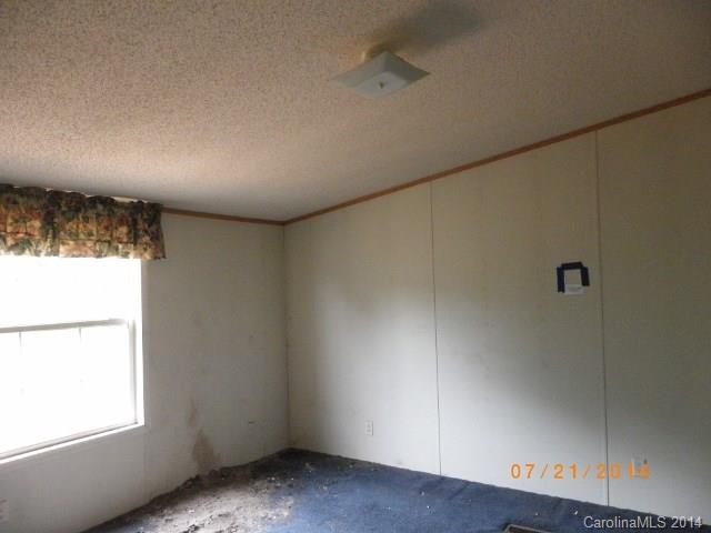 1978 Steel Hill Road Van Wyck, SC 29720 - Photo 4 of 9 a view of empty room with windows