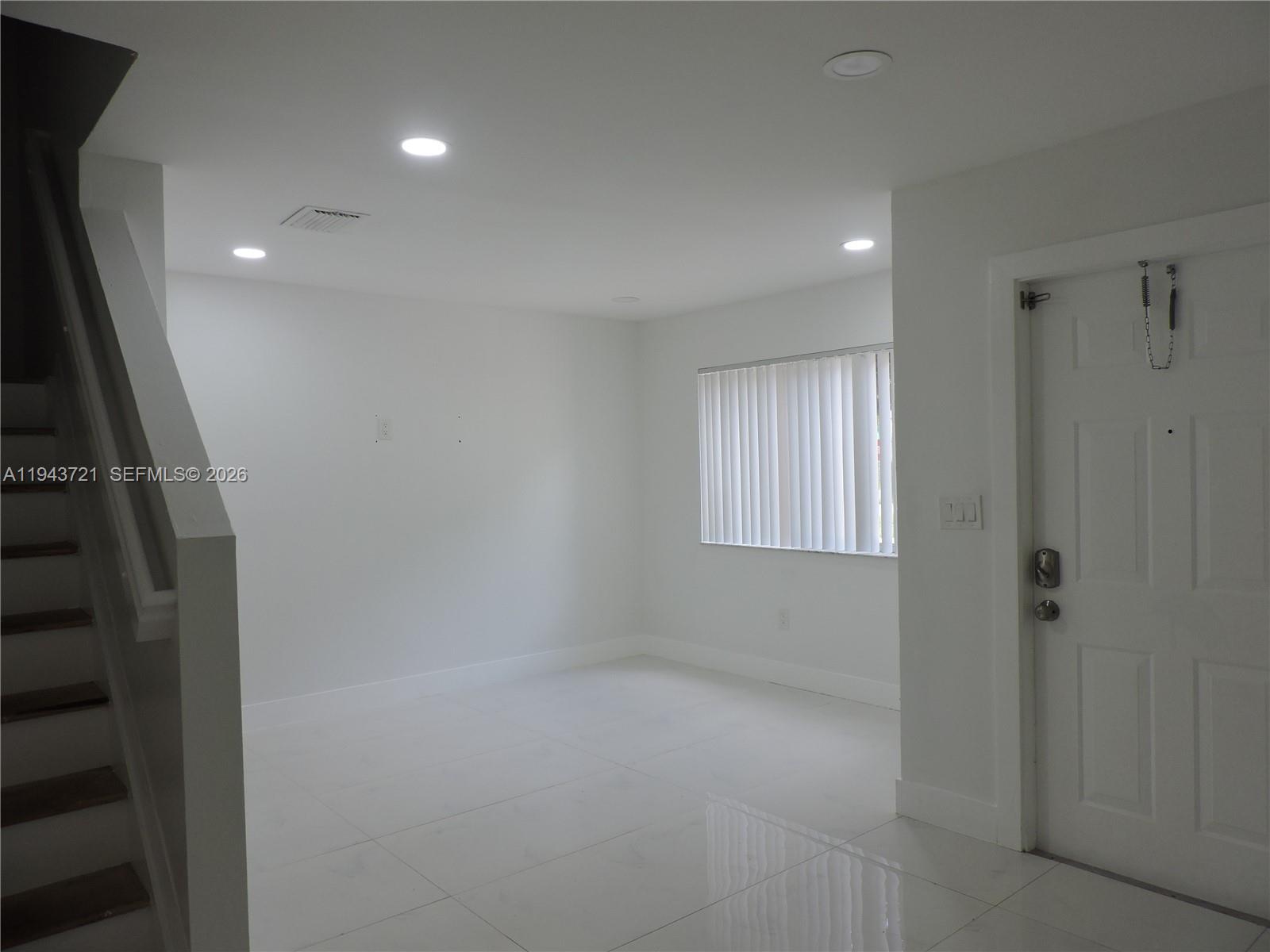 17975 Southwest 140th Court, Unit 17975 Miami, FL 33177 - Photo 10 of 27 a view of hallway with window