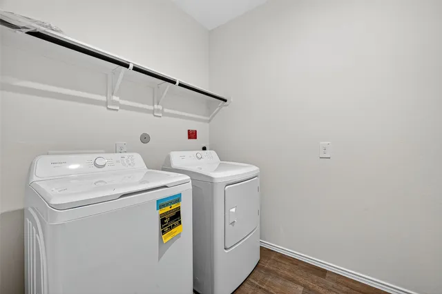a utility room with dryer and washer
