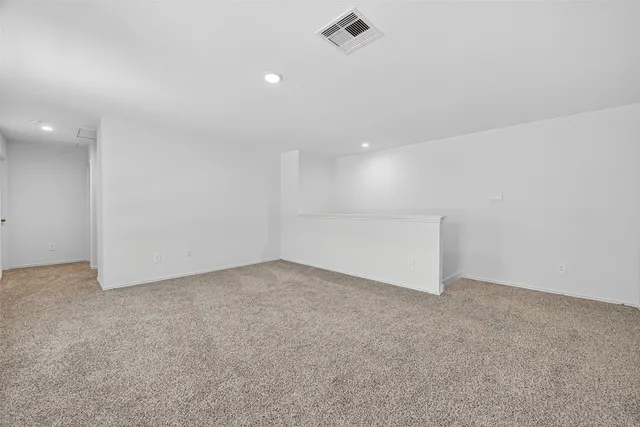 an empty room with an entryway