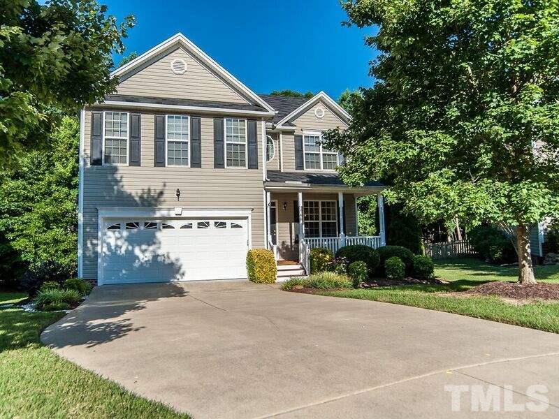 4728 Drewbridge Way Raleigh, NC 27604 - Photo 14 of 15 a front view of a house with a yard