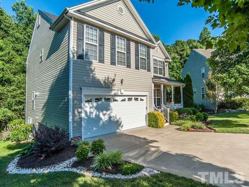 4728 Drewbridge Way Raleigh, NC 27604 - Photo 15 of 15 a front view of a house with garden