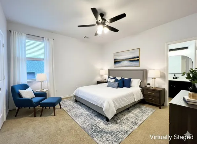 a bedroom with a bed and furniture